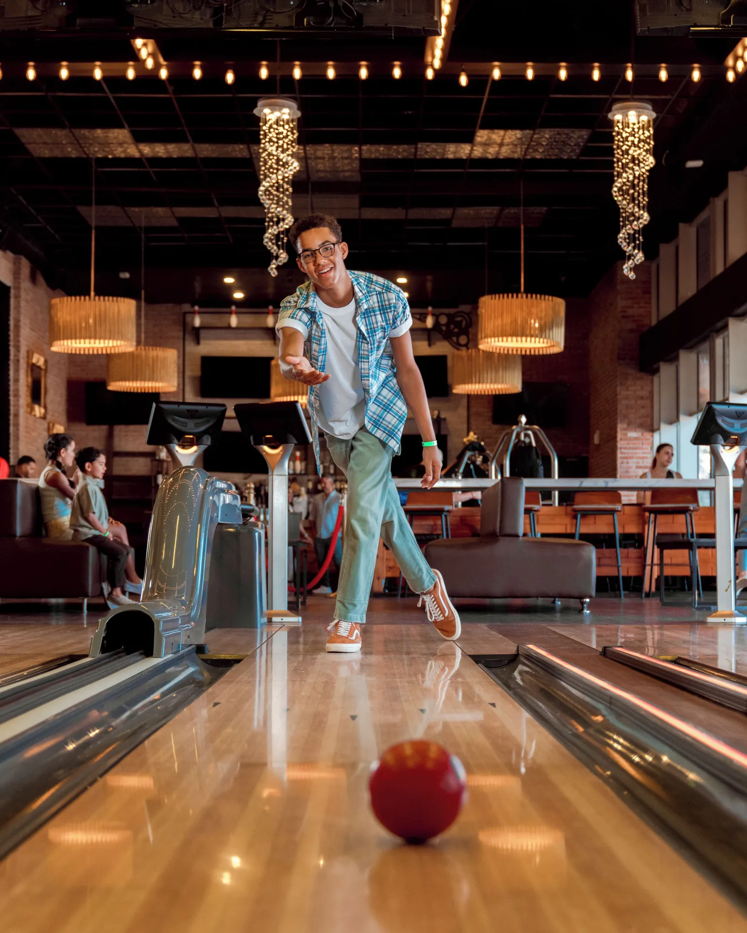 A guest bowls inside Bowling Bar at Hard Rock Hotel & Casino Punta Cana.