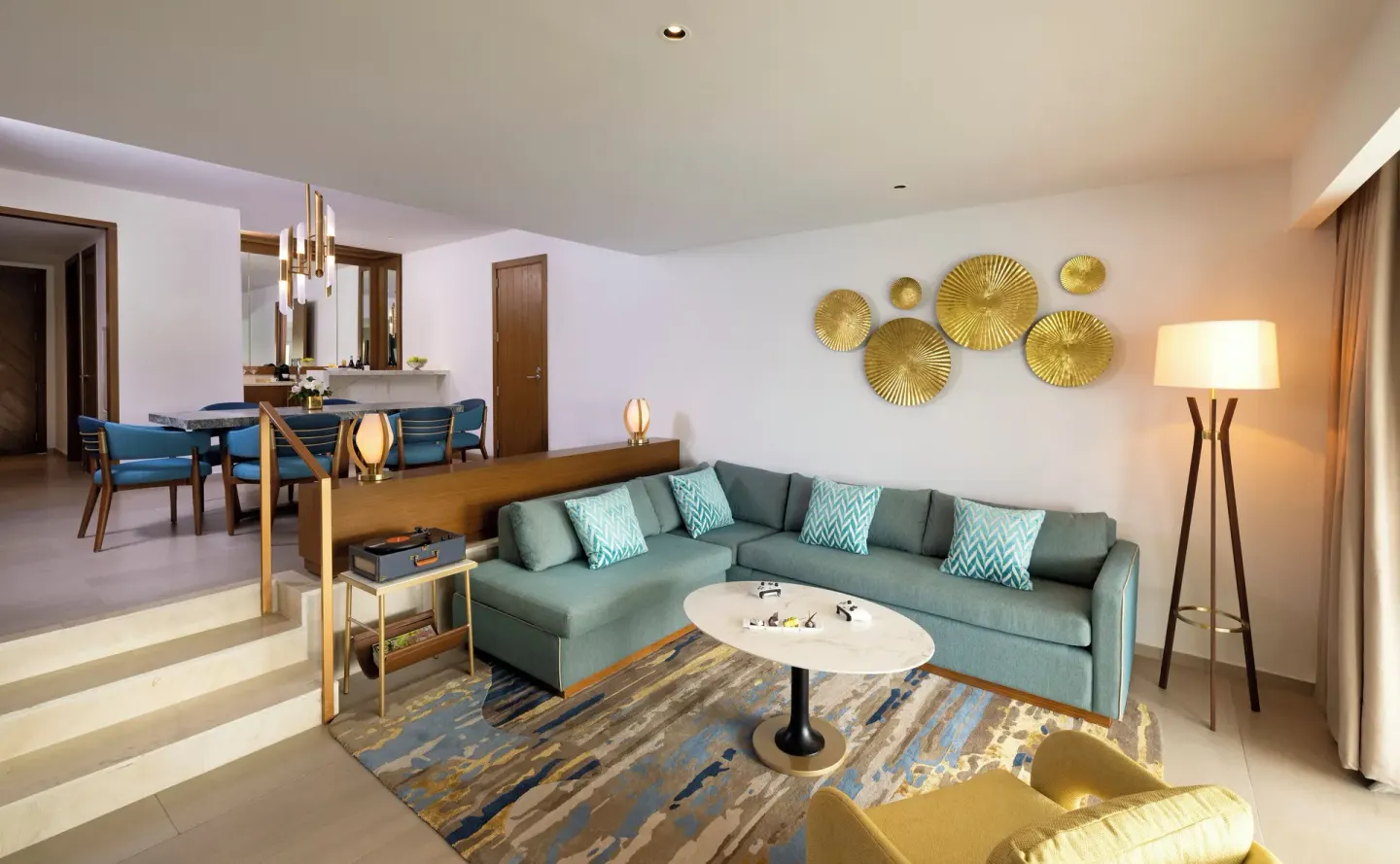Living room with sectional sofa in a Rock Family Suite at Hard Rock Hotel & Casino Punta Cana.