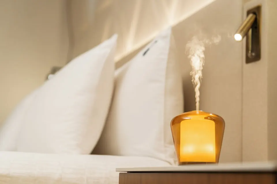 Rock Royalty Caribbean Sand Suite bedside diffuser and pillows at Hard Rock Hotel & Casino Punta Cana.