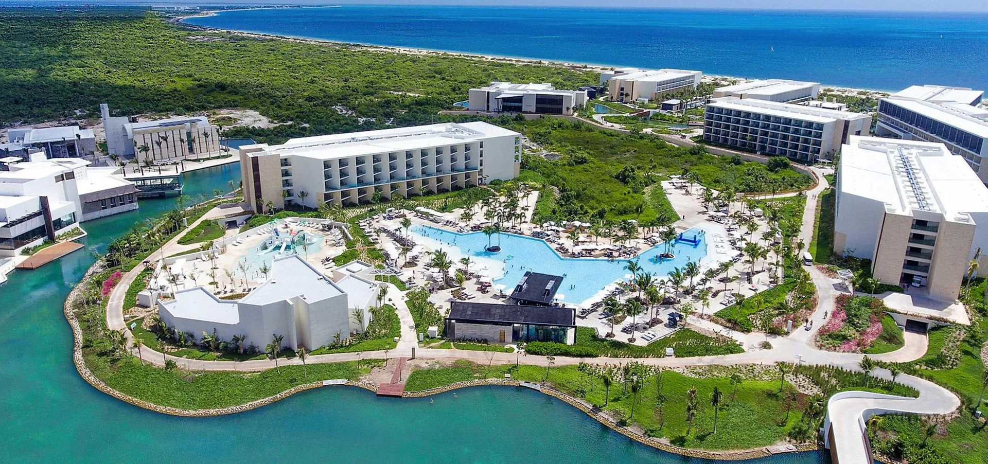 Grand Palladium Select Costa Mujeres family all-inclusive resort with expansive pools and beachfront setting in Costa Mujeres, Mexico.