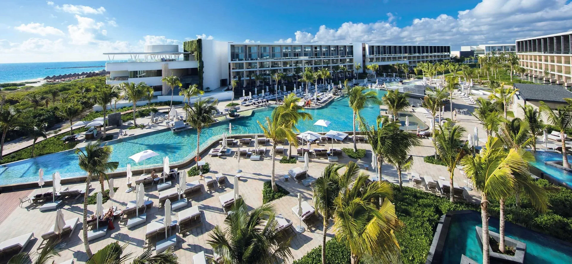 TRS Coral Hotel adults-only all-inclusive resort with beachfront setting and luxury amenities in Costa Mujeres, Mexico.