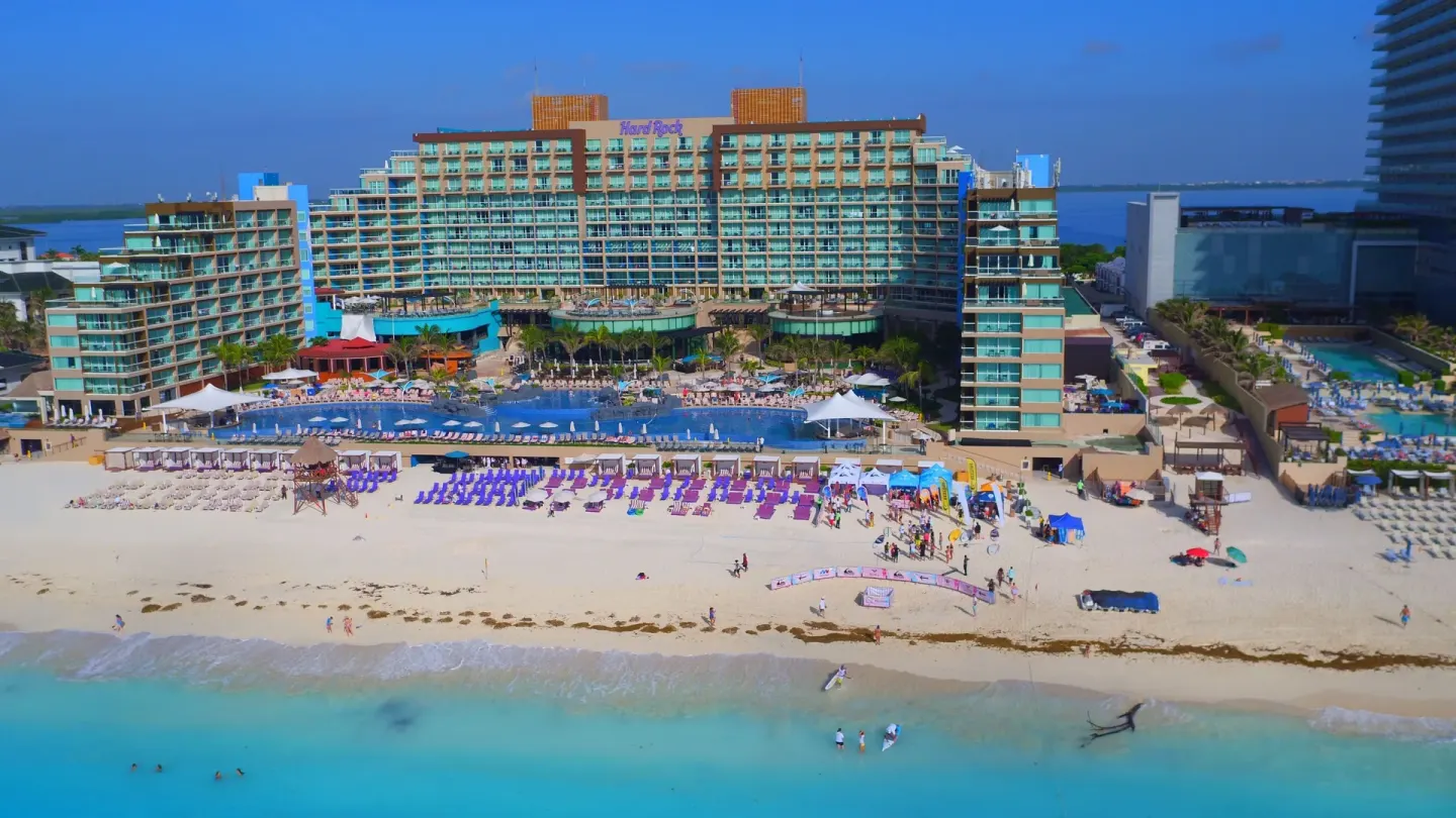 Aerial view of the beachfront resort, pools, and sand at Hard Rock Hotel Cancun.