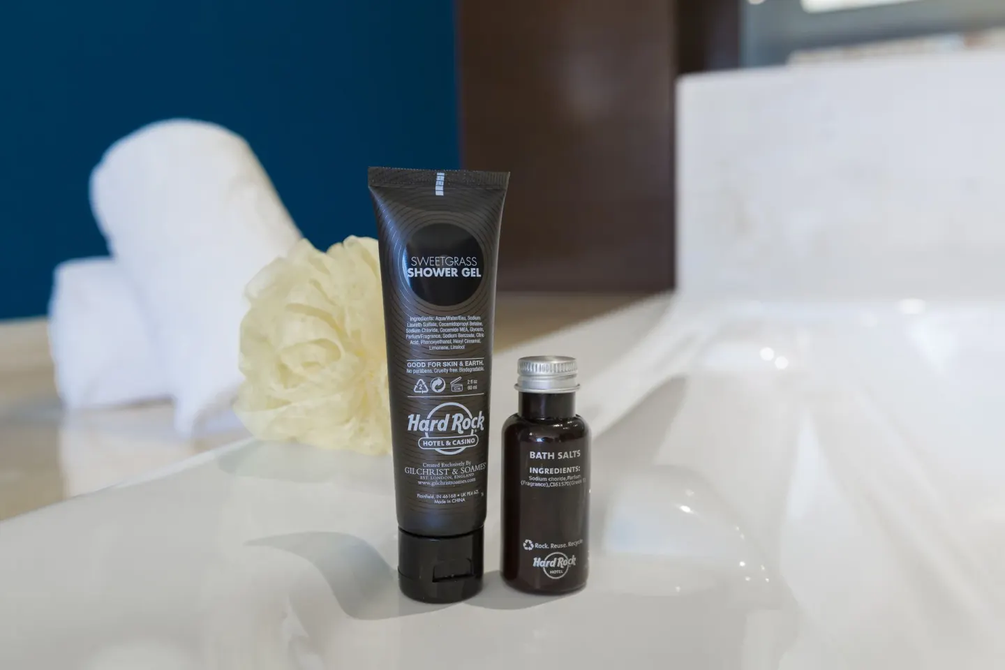 Bath amenities beside a white tub at Hard Rock Hotel Cancun.
