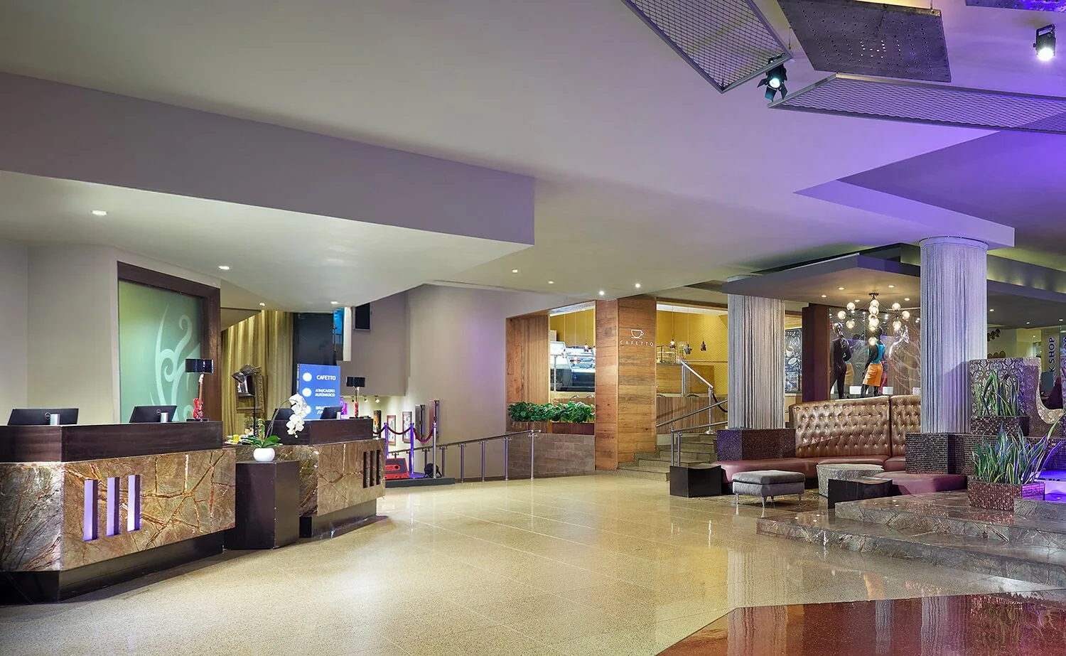 Lobby reception desks and lounge seating at Hard Rock Hotel Cancun.