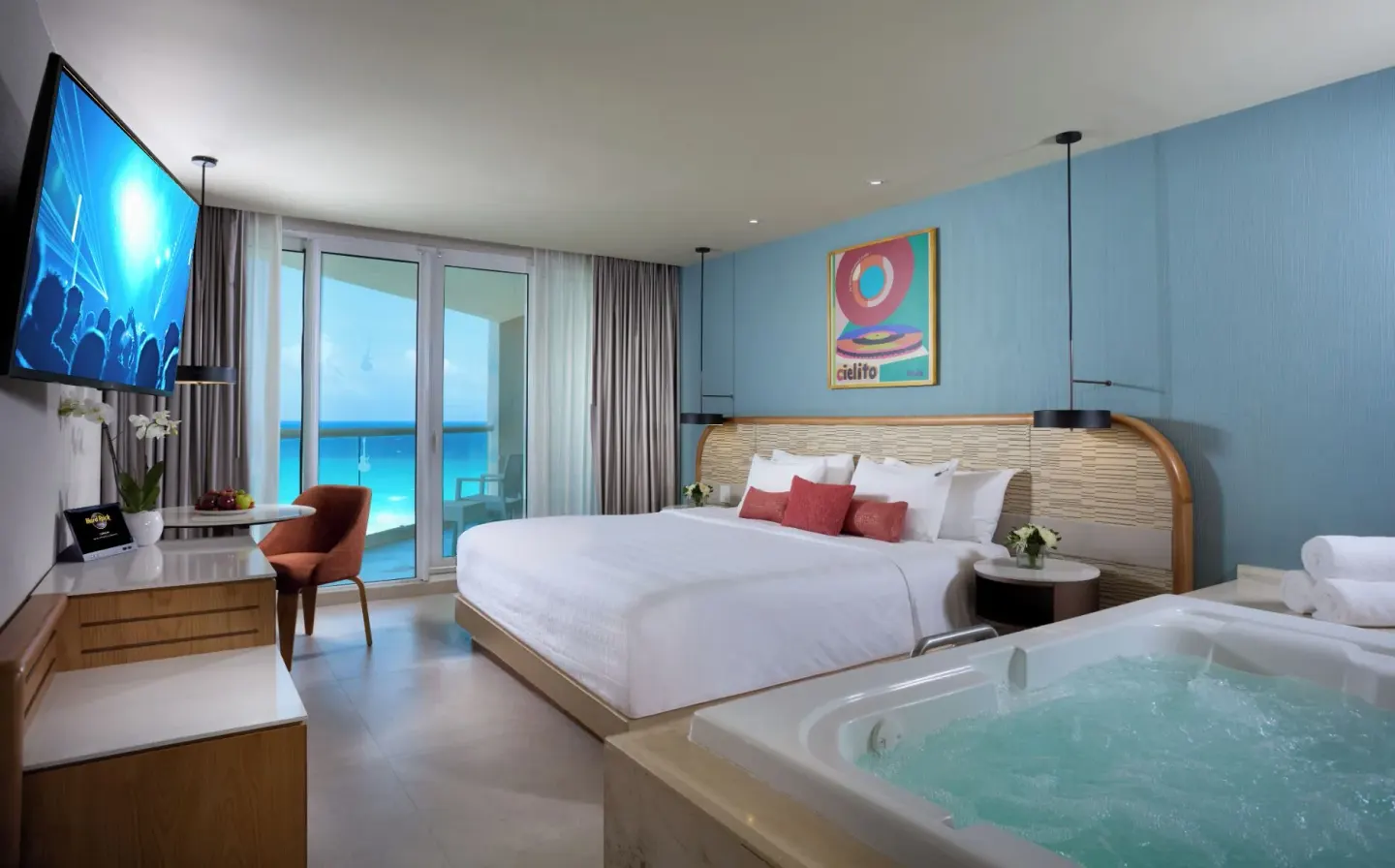 Deluxe Ocean View room with king bed and in-room tub at Hard Rock Hotel Cancun.