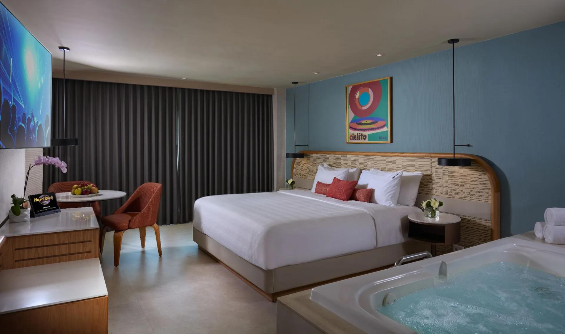 Deluxe room with king bed and in-room tub at Hard Rock Hotel Cancun.