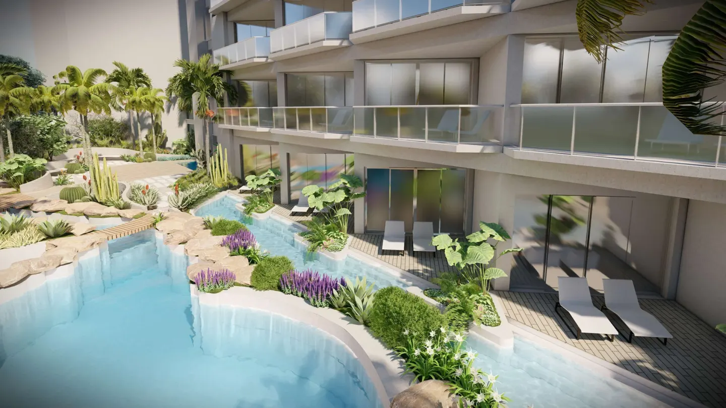 Lagoon-style pool and patios outside guest rooms at Hilton Aruba Caribbean Resort and Casino.