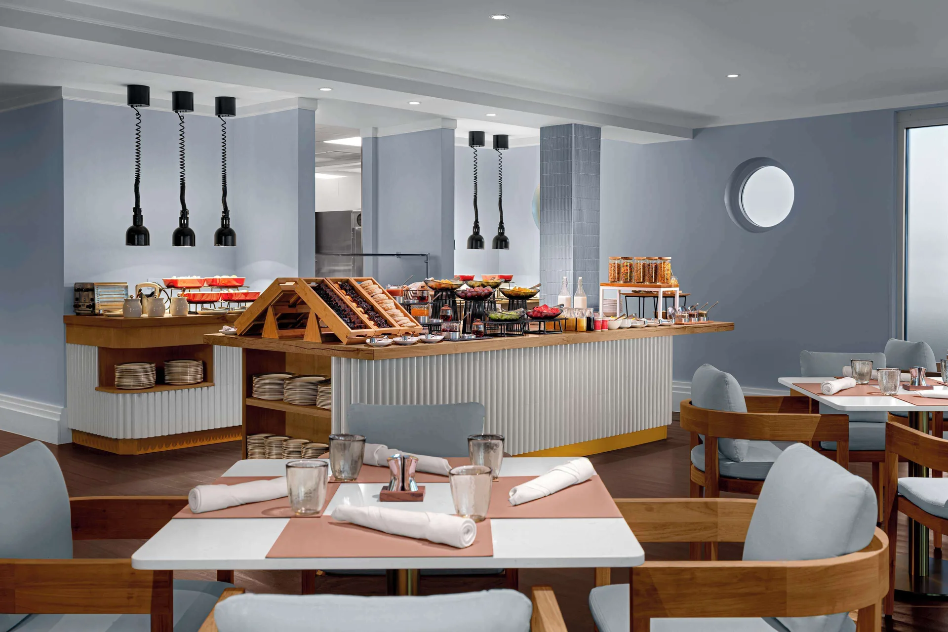 Breakfast buffet and dining tables at Hilton Aruba Caribbean Resort and Casino.
