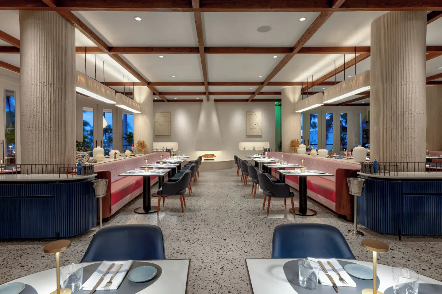 Modern restaurant dining room with set tables at Hilton Aruba Caribbean Resort and Casino.