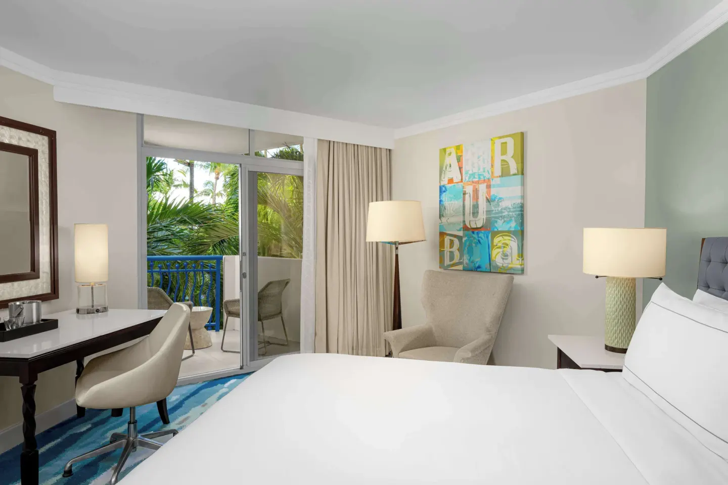 King garden-view room with balcony at Hilton Aruba Caribbean Resort and Casino.