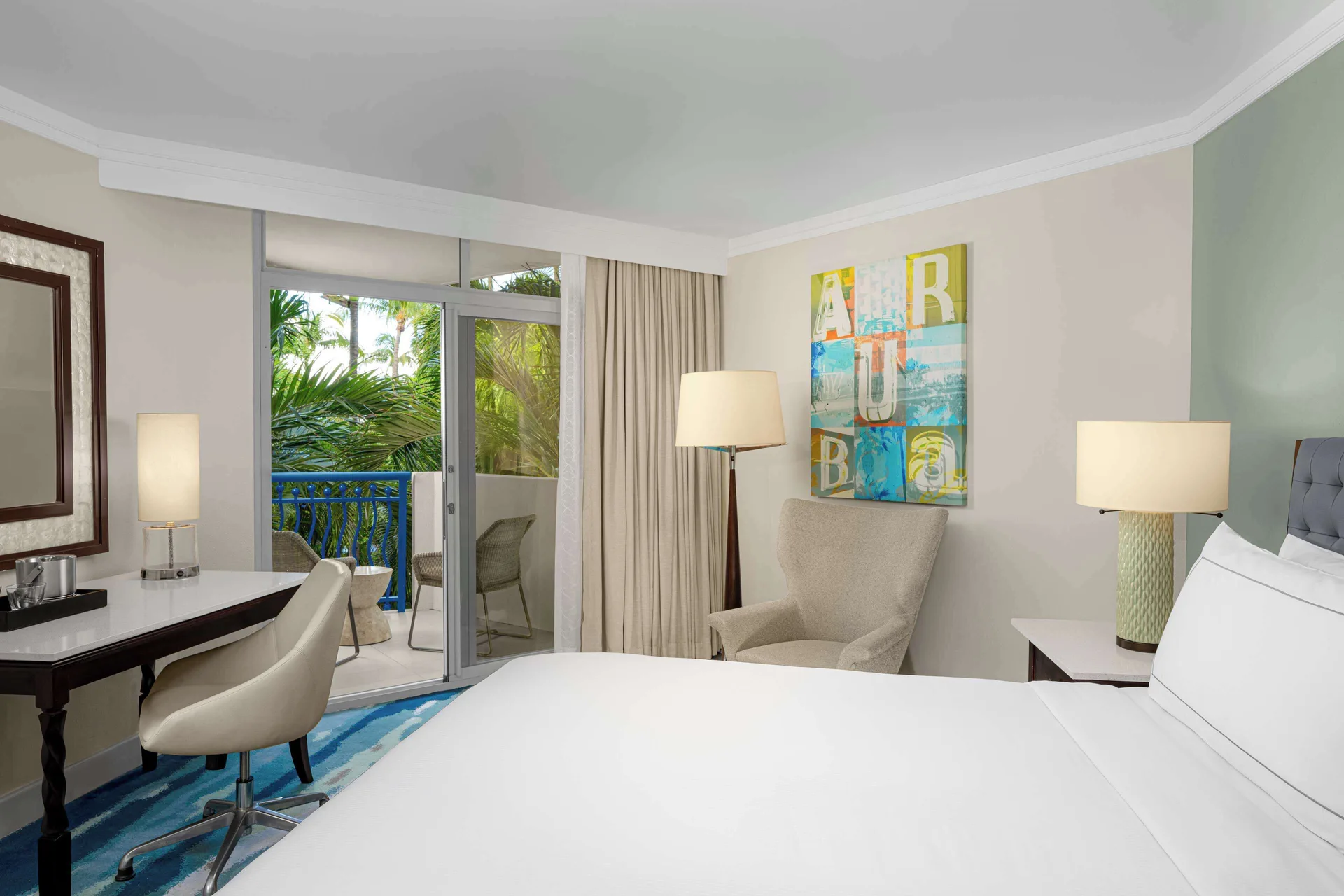 King garden-view room with balcony at Hilton Aruba Caribbean Resort and Casino.