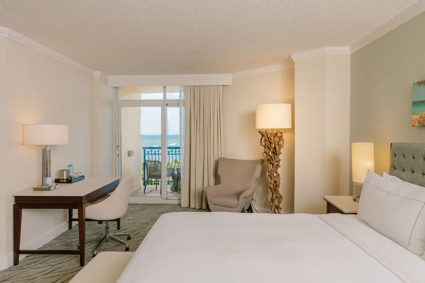 Ocean View room with king bed and balcony at Hilton Aruba Caribbean Resort and Casino.