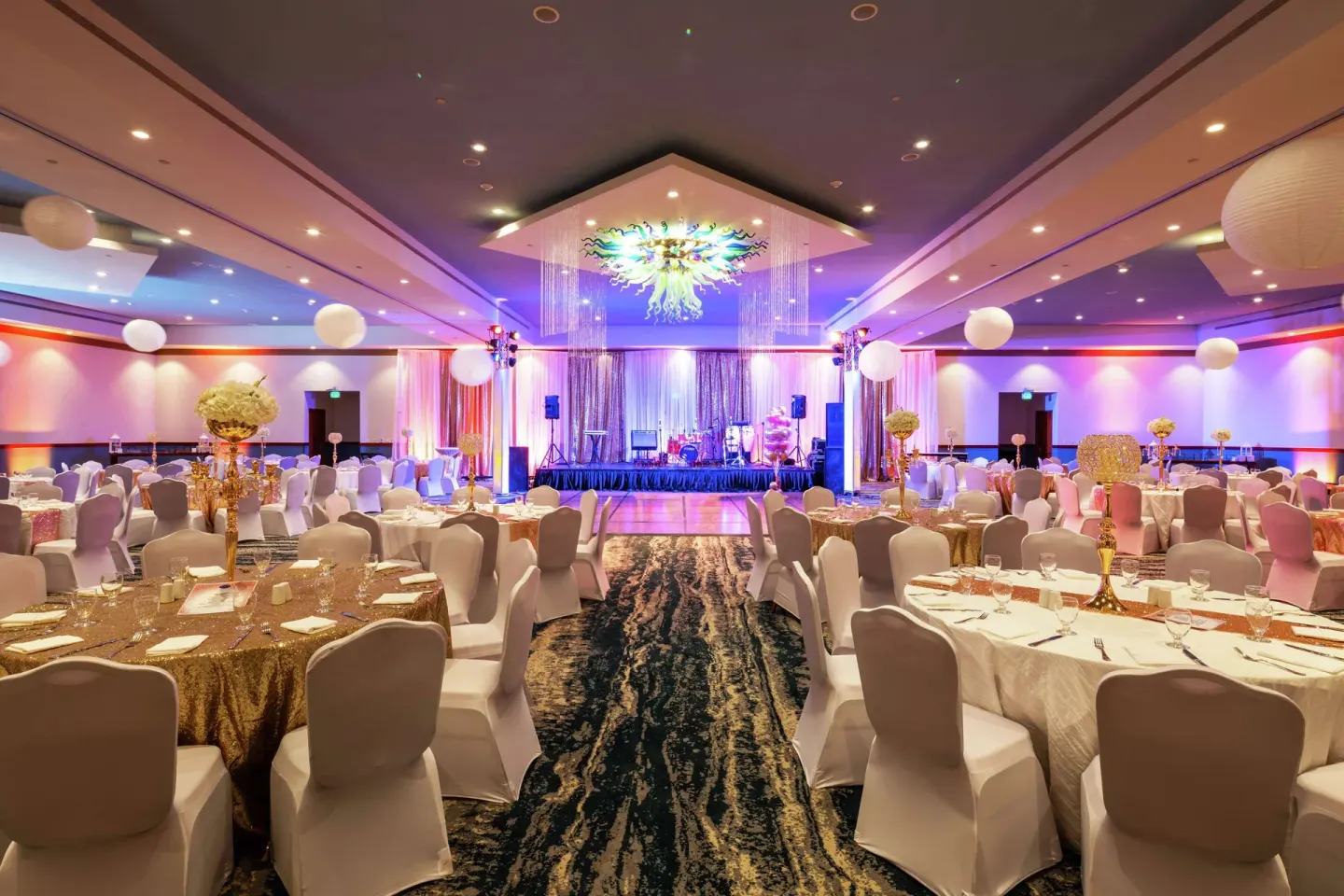 Ballroom set for a banquet and dance floor at Hilton Aruba Caribbean Resort and Casino.