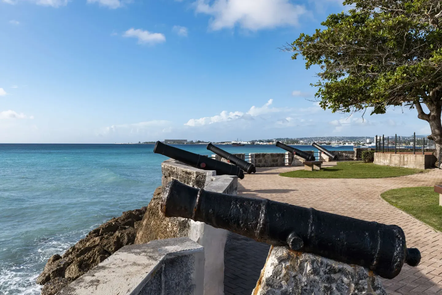 Historic cannons along the rocky oceanfront at Hilton Barbados Resort.