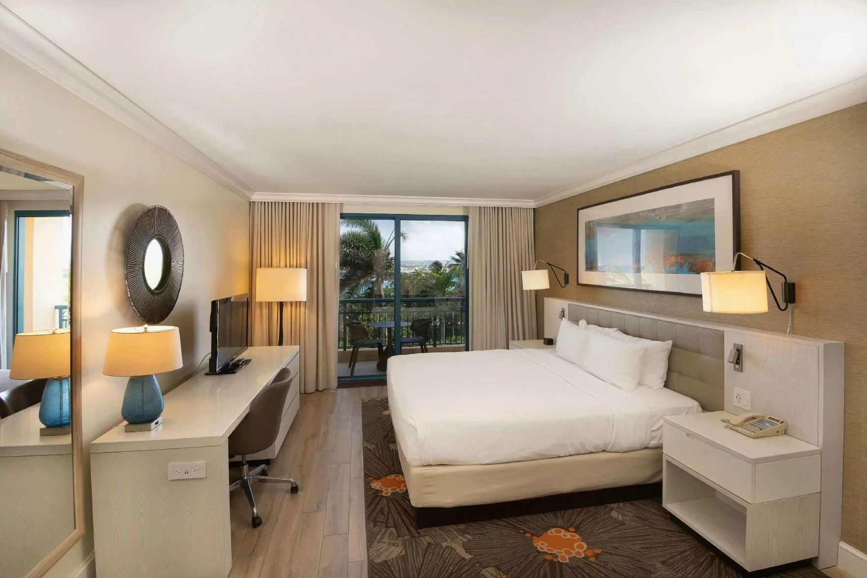 Residence 1 Bedroom Suite king bed and balcony at Hilton Barbados Resort.