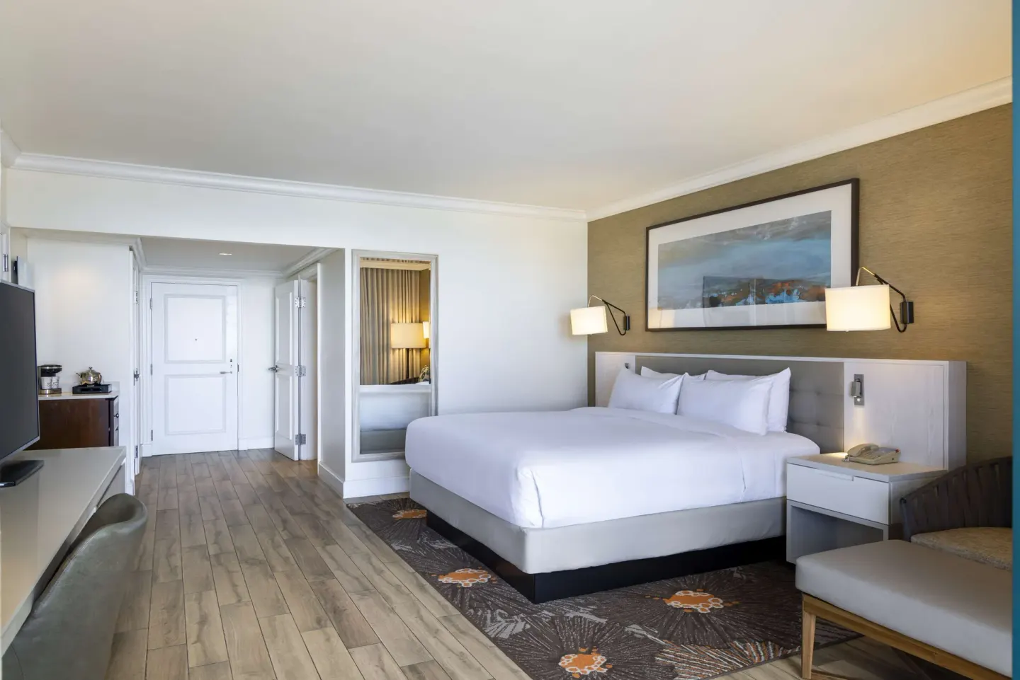 Accessible ocean view king room with entry area and seating at Hilton Barbados Resort.