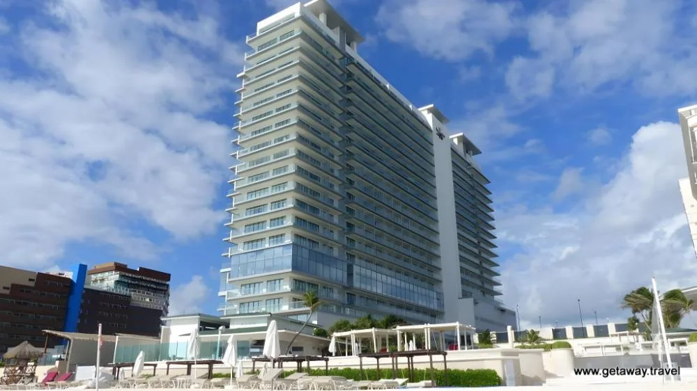 Secrets The Vine Cancun adults-only all-inclusive resort with beachfront pools, modern tower, and luxury amenities in Cancun Hotel Zone.