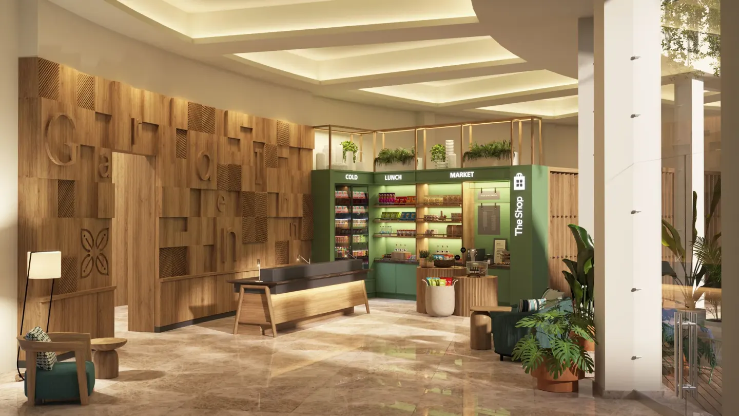 Reception desk and market area in the lobby at Hilton Garden Inn Cancun Airport.