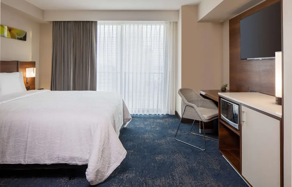 Standard accessible hearing room with king bed and desk at Hilton Garden Inn Waikiki Beach.