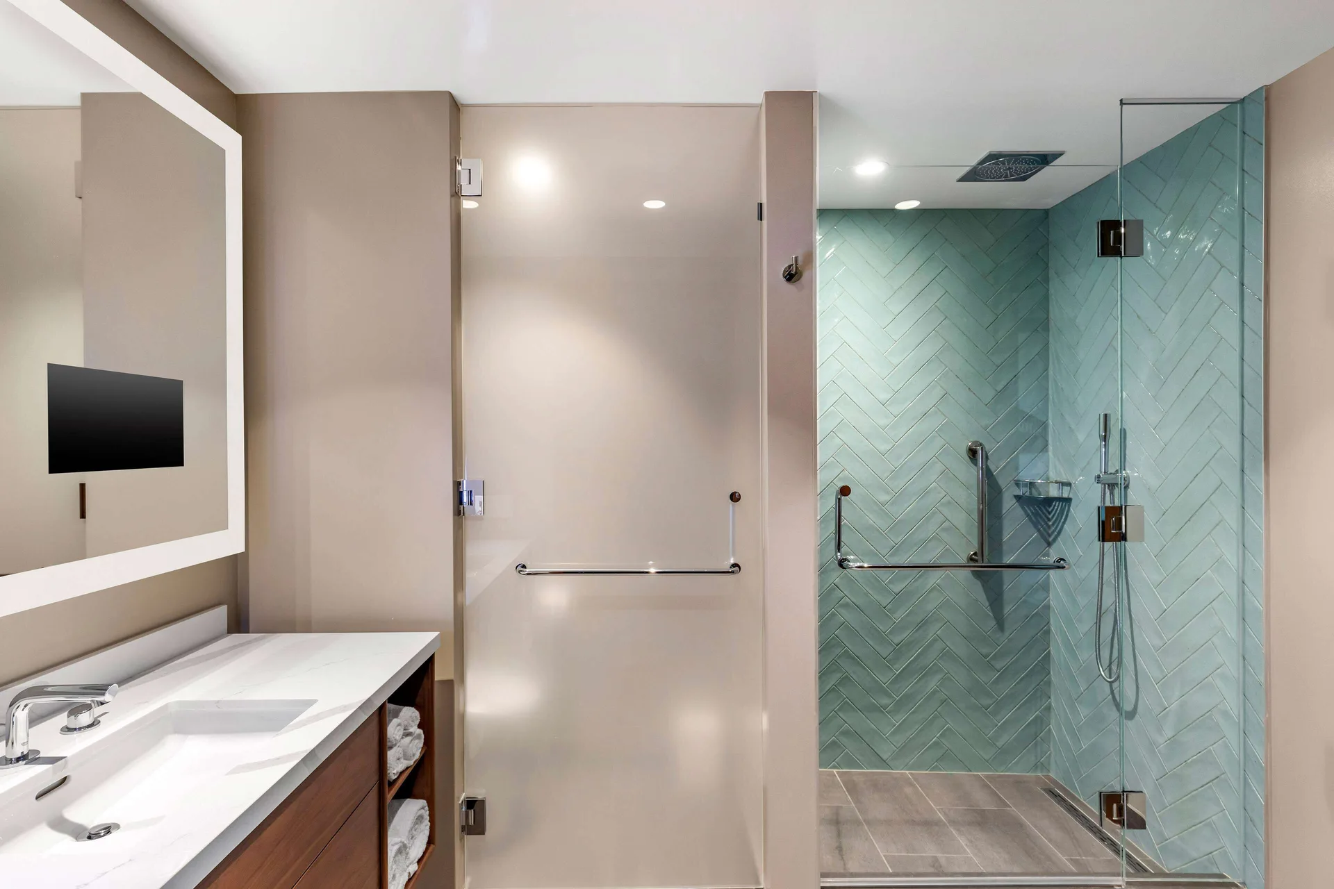 2-Bedroom Penthouse at Hilton Grand Vacations Club Maui Bay Villas with glass shower, modern bathroom, and upgraded finishes in Maui, Hawaii.