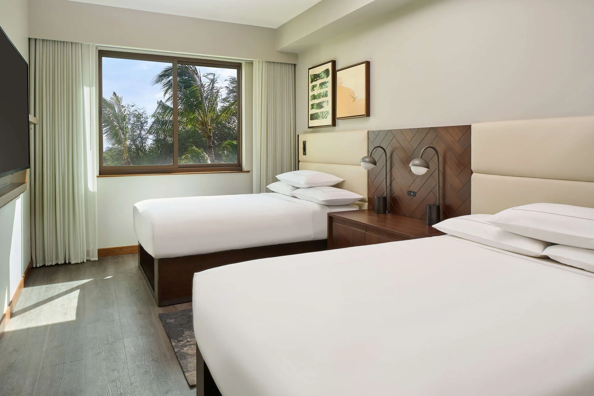 Two-bed guest room in a 2 Bedroom suite at Hilton Grand Vacations Club Maui Bay Villas.