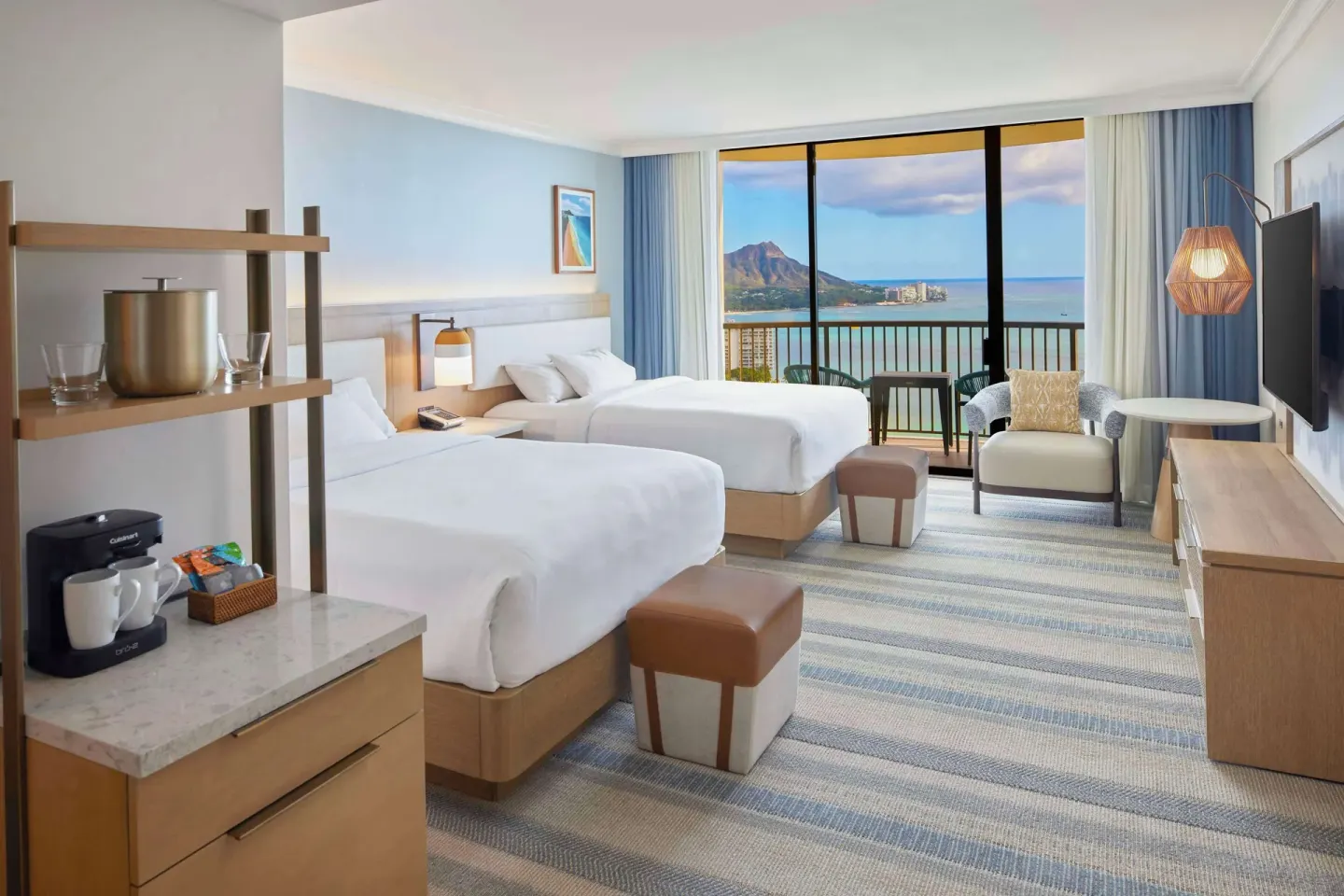 Two-bed guest room with Diamond Head and ocean views at Hilton Hawaiian Village Waikiki Beach Resort.