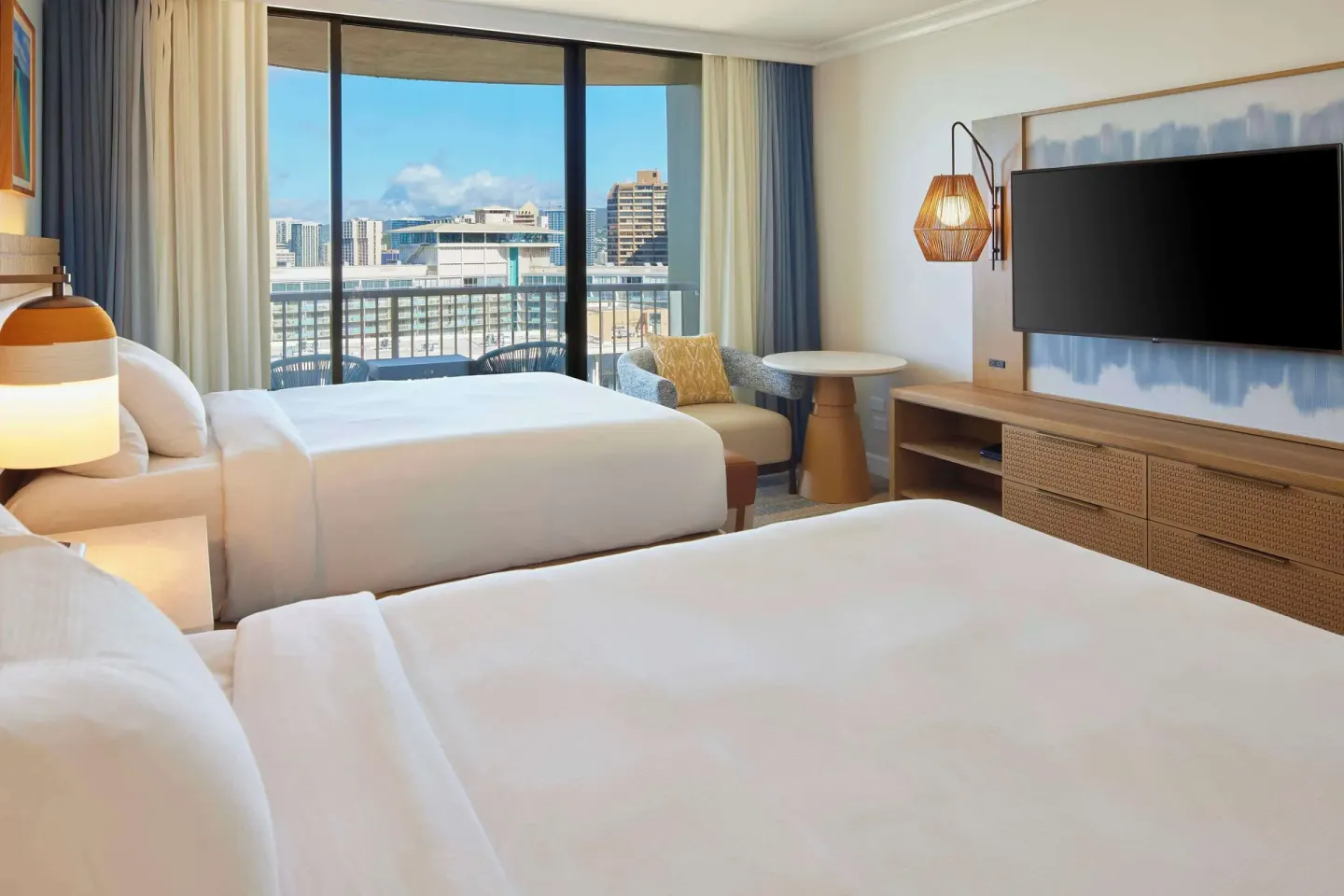 Accessible ocean view room with two beds and balcony at Hilton Hawaiian Village Waikiki Beach Resort.