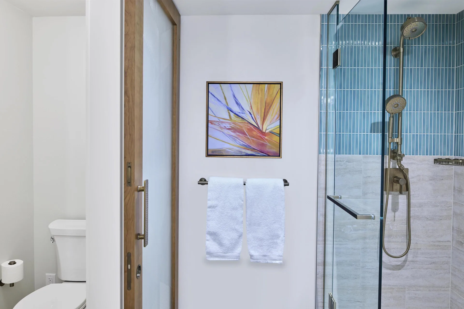 Alii Tower room bathroom with glass shower at Hilton Hawaiian Village Waikiki Beach Resort.