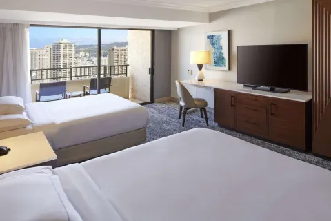 Two-bed room with city and resort views at Hilton Hawaiian Village Waikiki Beach Resort.