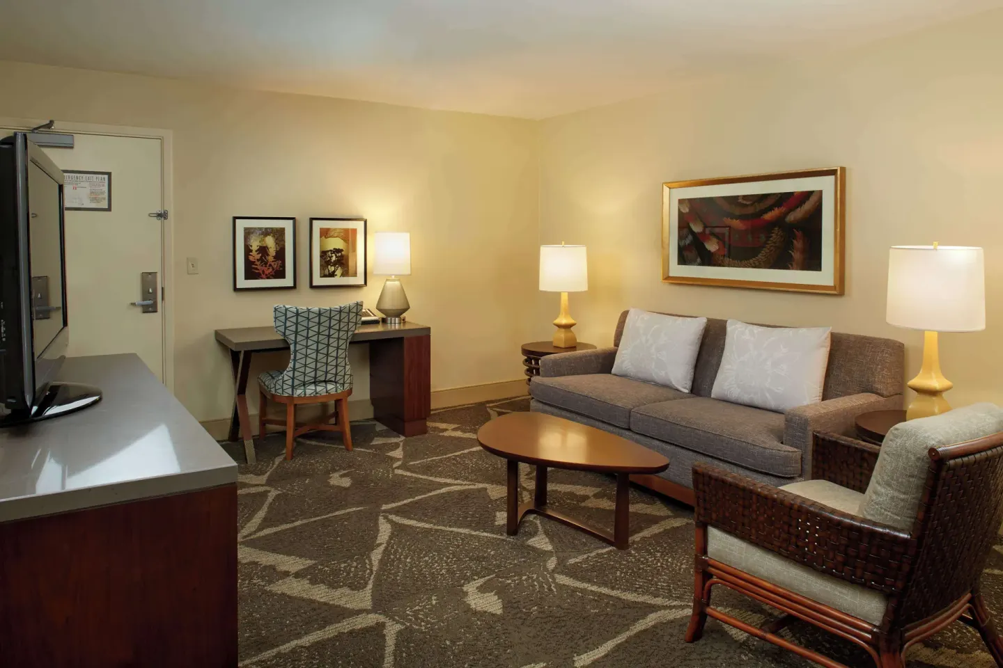 Living area of a 1 Bedroom Ocean View Suite at Hilton Hawaiian Village Waikiki Beach Resort.
