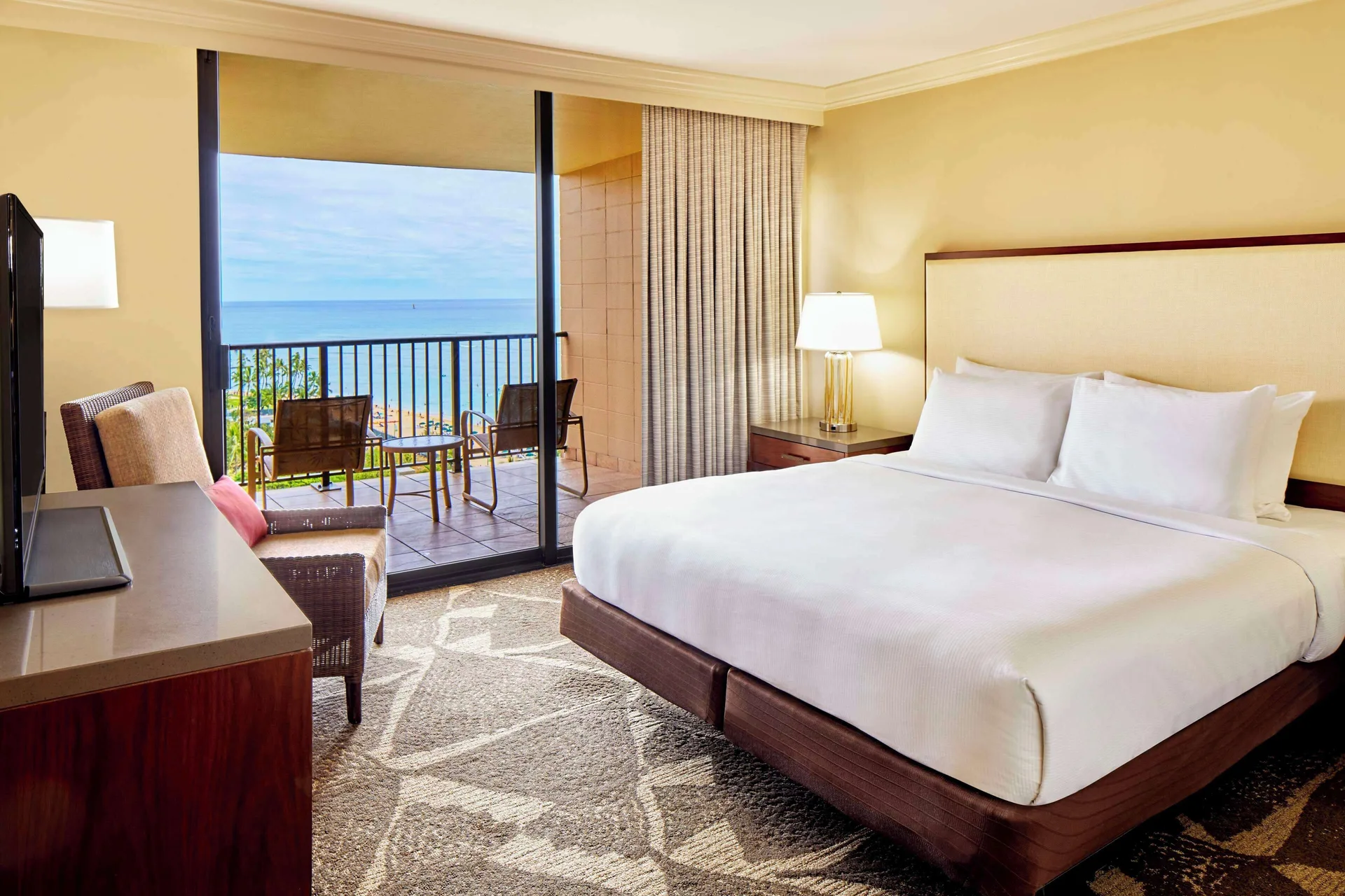 One bedroom suite at Diamond Head Tower with king bed, ocean view balcony at Hilton Hawaiian Village Waikiki Beach Resort.