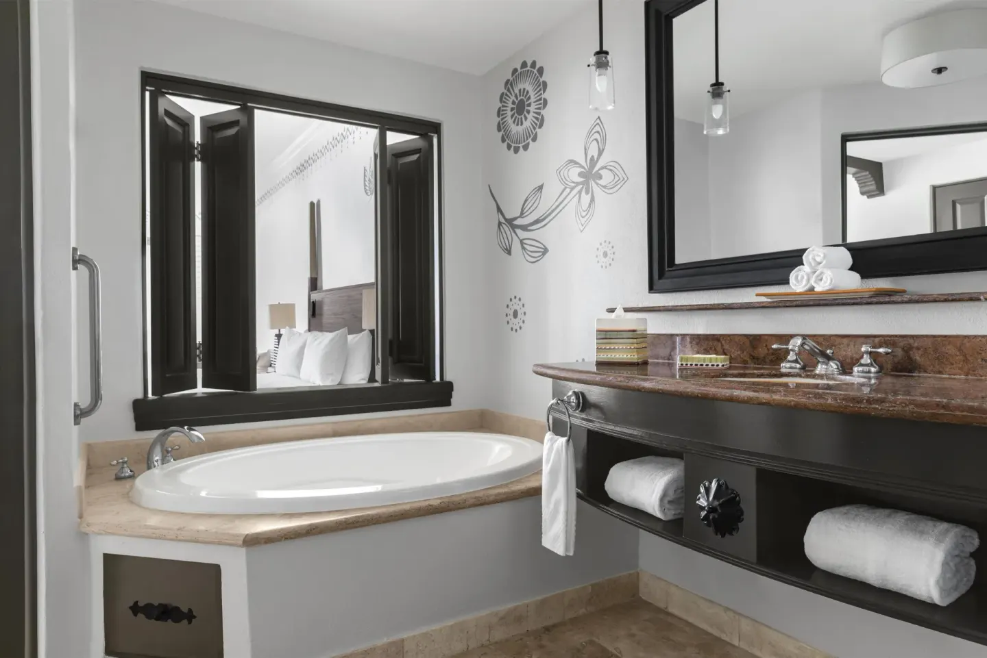 Altamar Junior Suite bathroom with soaking tub and vanity at Hilton Los Cabos.