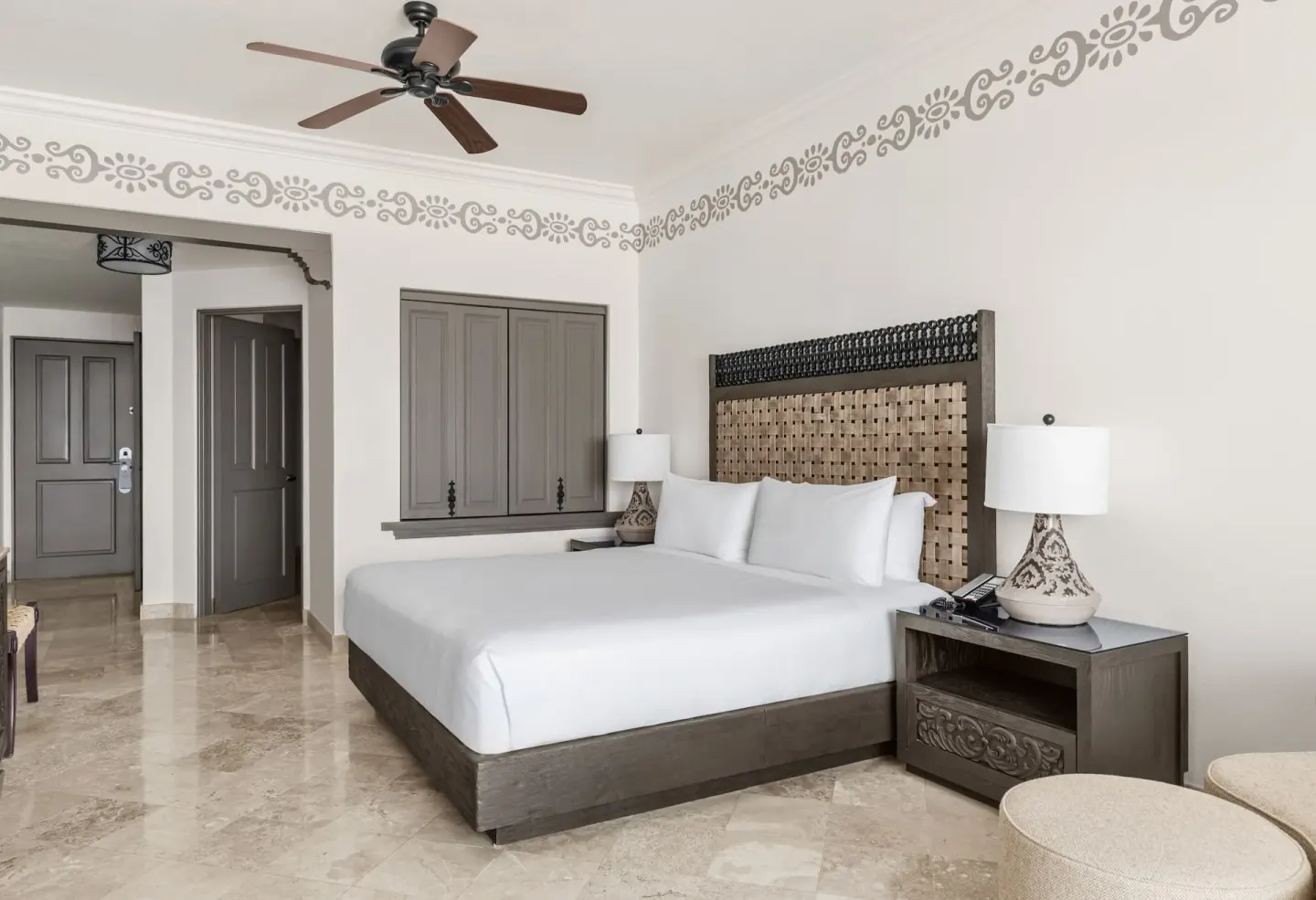 Deluxe Mobility Accessible room with king bed and nightstands at Hilton Los Cabos.