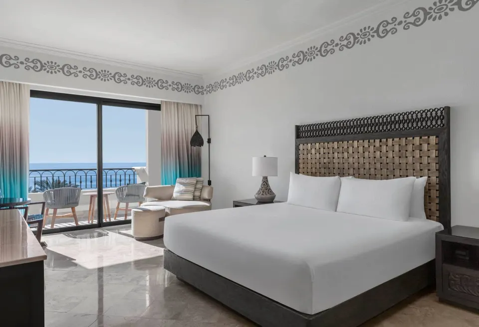 Deluxe Mobility Accessible king room with balcony and ocean view at Hilton Los Cabos.