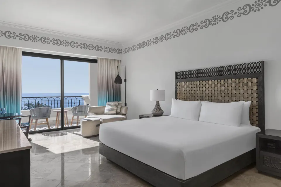 Accessible Deluxe Ocean View king room with balcony and sea view at Hilton Los Cabos.
