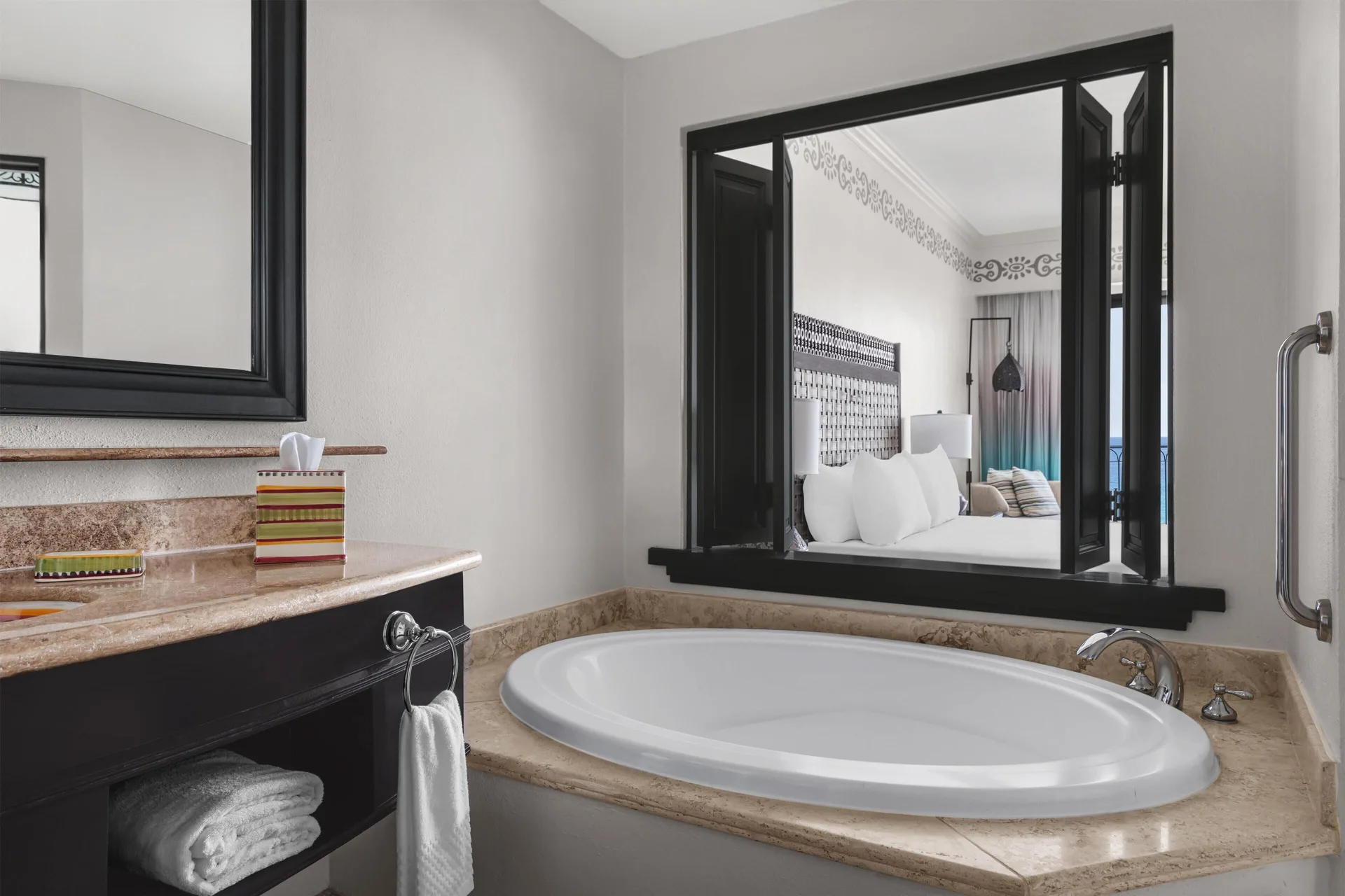 Deluxe Room Ocean View bathroom with soaking tub at Hilton Los Cabos.