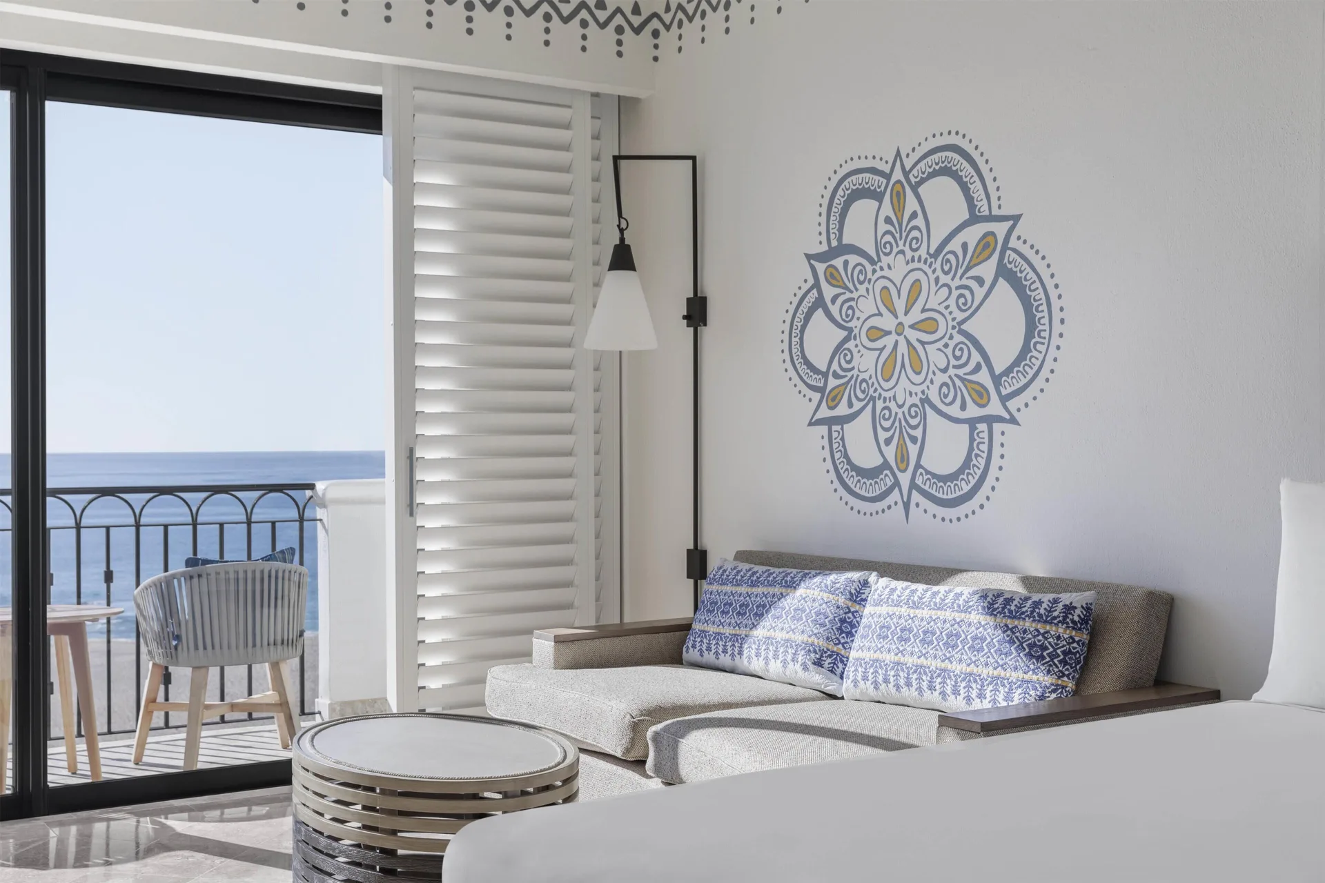 Deluxe Room Ocean View Balcony at Hilton Los Cabos with sofa bed, ocean balcony, and contemporary design.