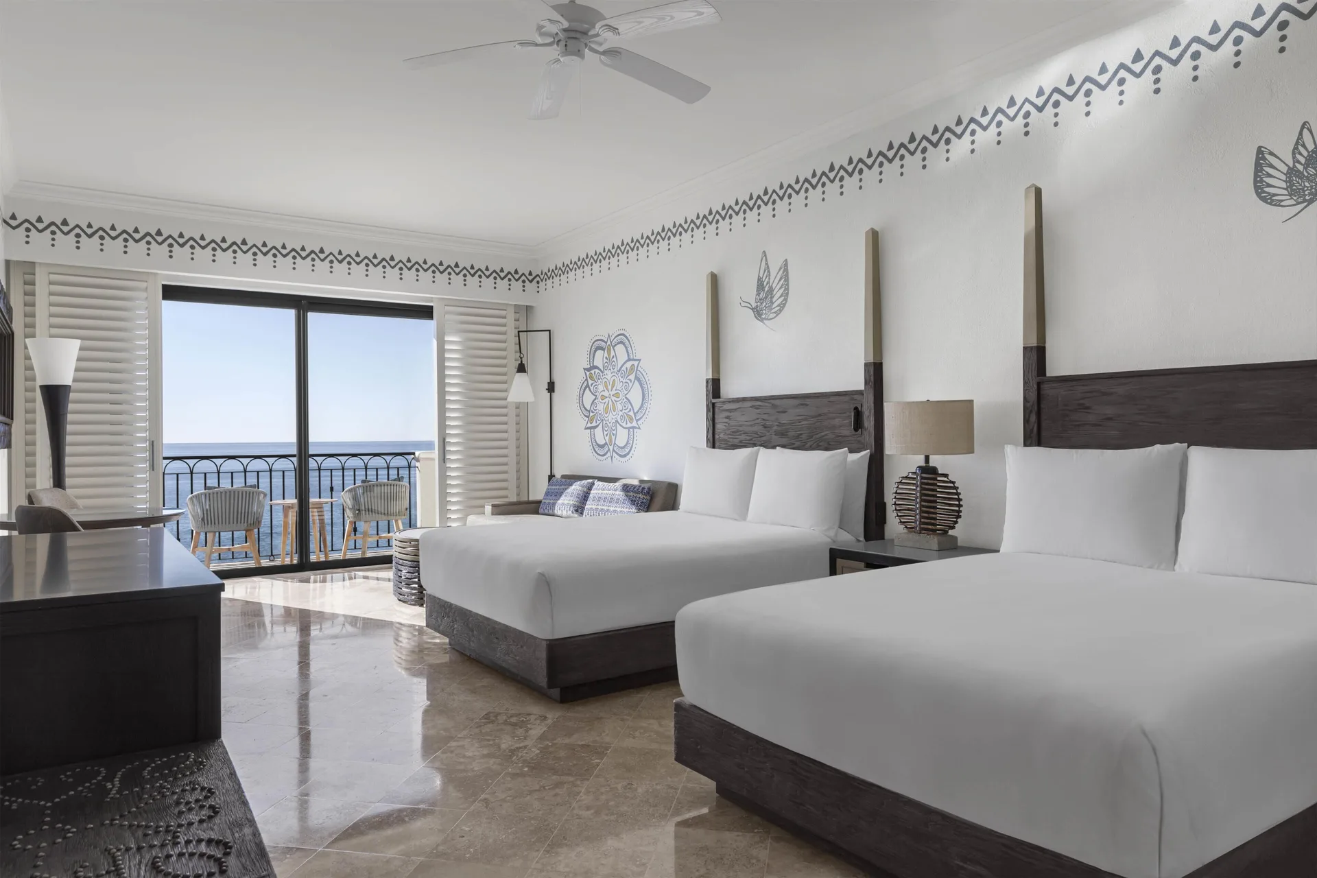 Elite Room with two beds and ocean-facing balcony at Hilton Los Cabos.