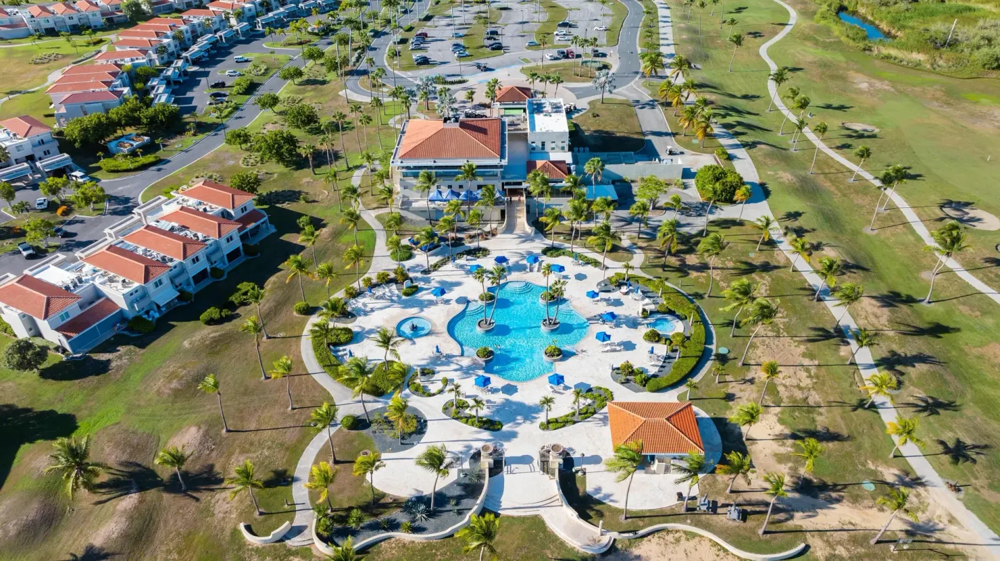 Aerial view of resort grounds, pool and golf course at Hilton Ponce Golf & Casino Resort.