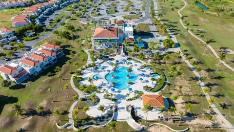 Aerial view of resort grounds, pool and golf course at Hilton Ponce Golf & Casino Resort.