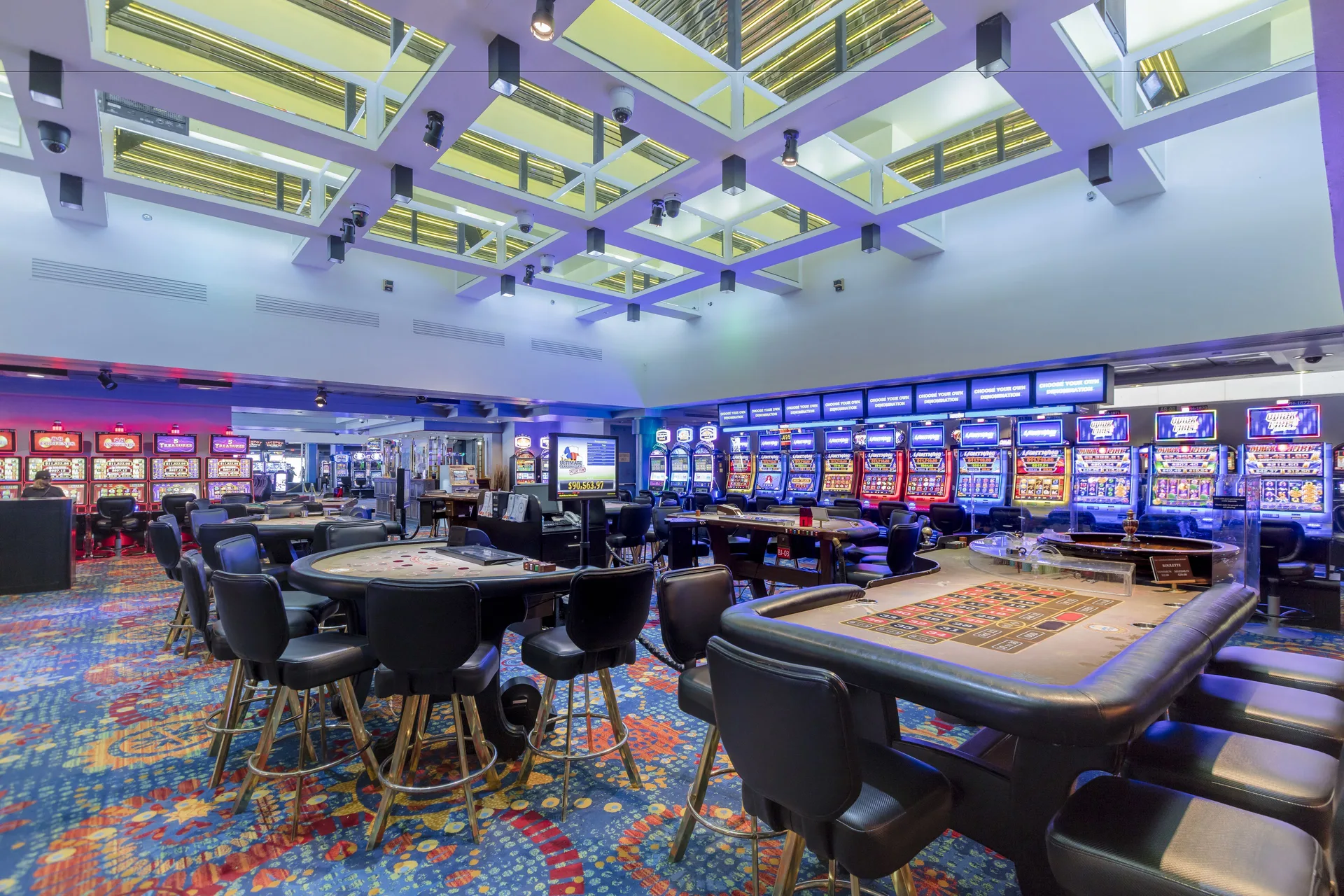 Casino gaming tables and slot machines at Hilton Ponce Golf & Casino Resort.