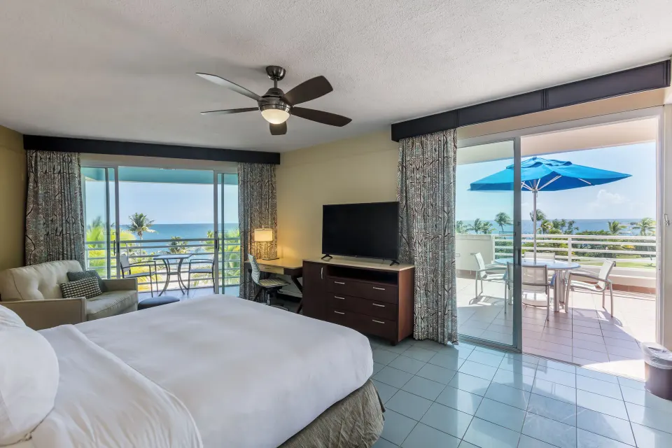 Caribbean Oceanview 1 room with bed and terrace at Hilton Ponce Golf & Casino Resort.