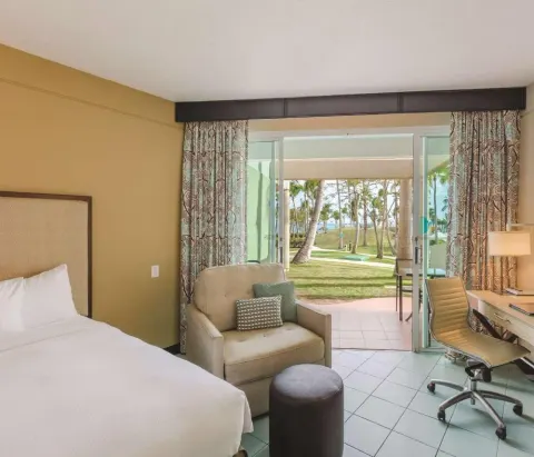 Garden view accessible king room seating area at Hilton Ponce Golf & Casino Resort.
