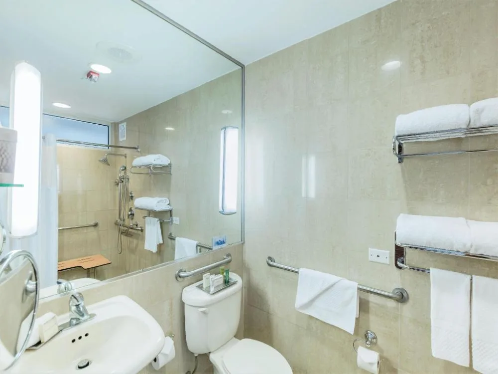 Accessible bathroom with roll-in shower at Hilton Ponce Golf & Casino Resort.