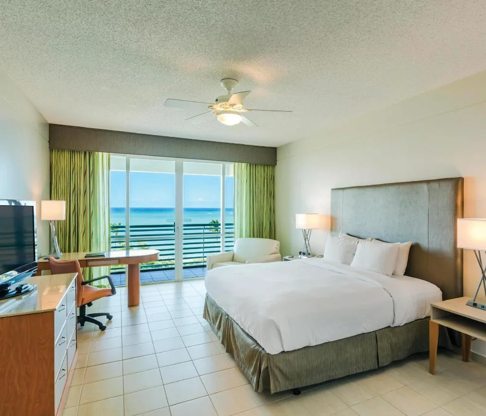 Ocean View mobility access king room with balcony at Hilton Ponce Golf & Casino Resort.