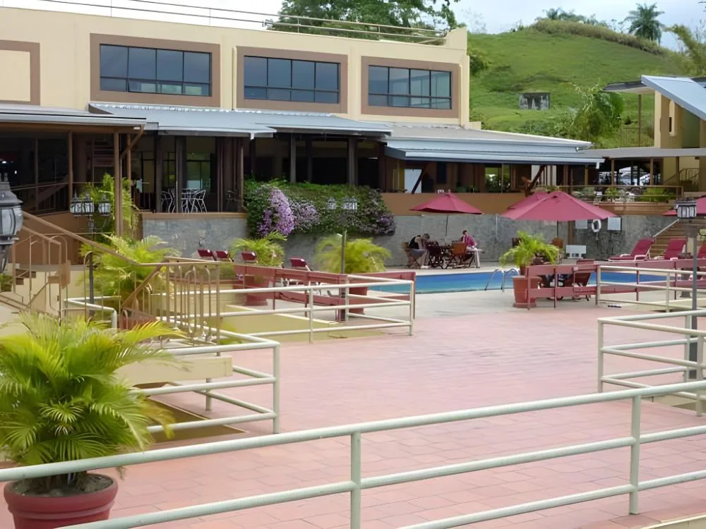 Cara Suites Hotel and Conference Centre Trinidad hotel with event space and south coast setting