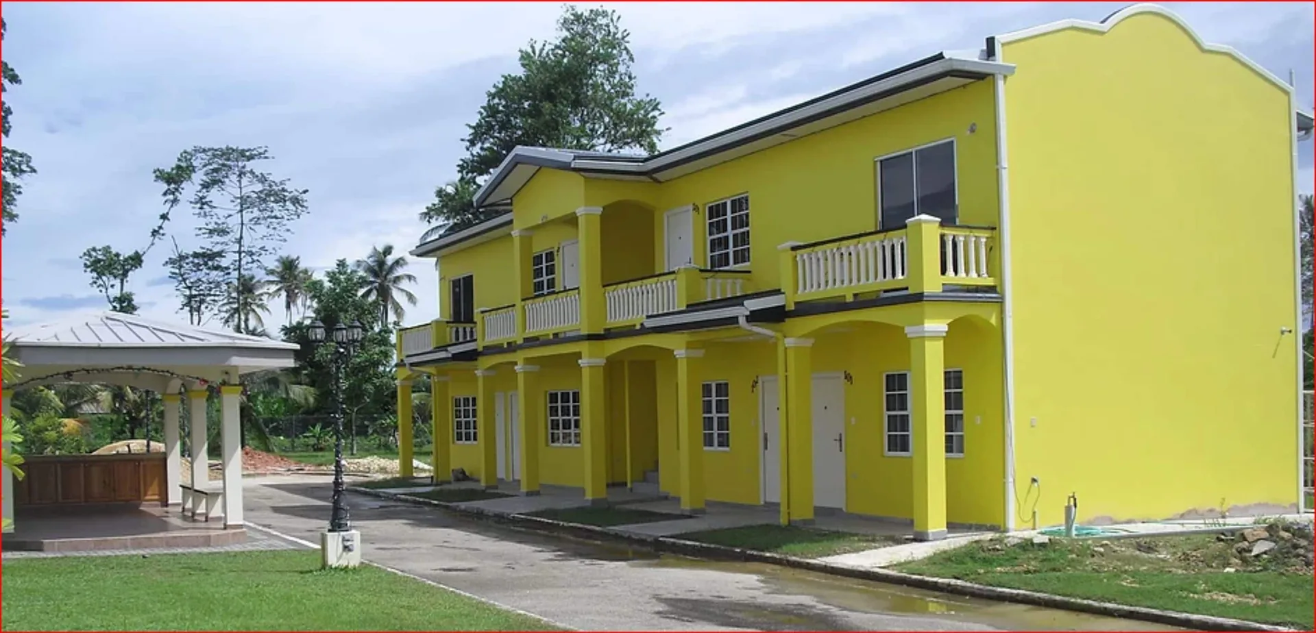 Piarco Village Suites airport guesthouse with home style rooms and convenient Piarco location