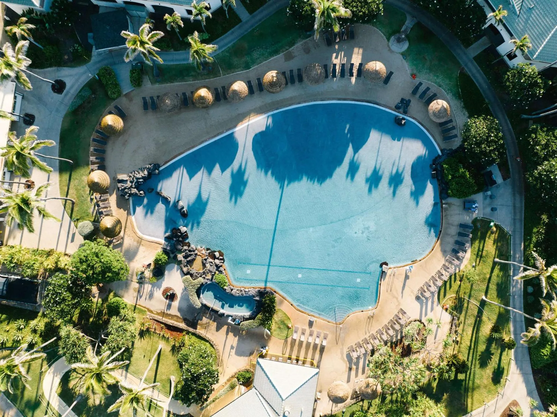 Aerial view of the pool deck at Hilton Vacation Club The Point At Poipu Kauai.