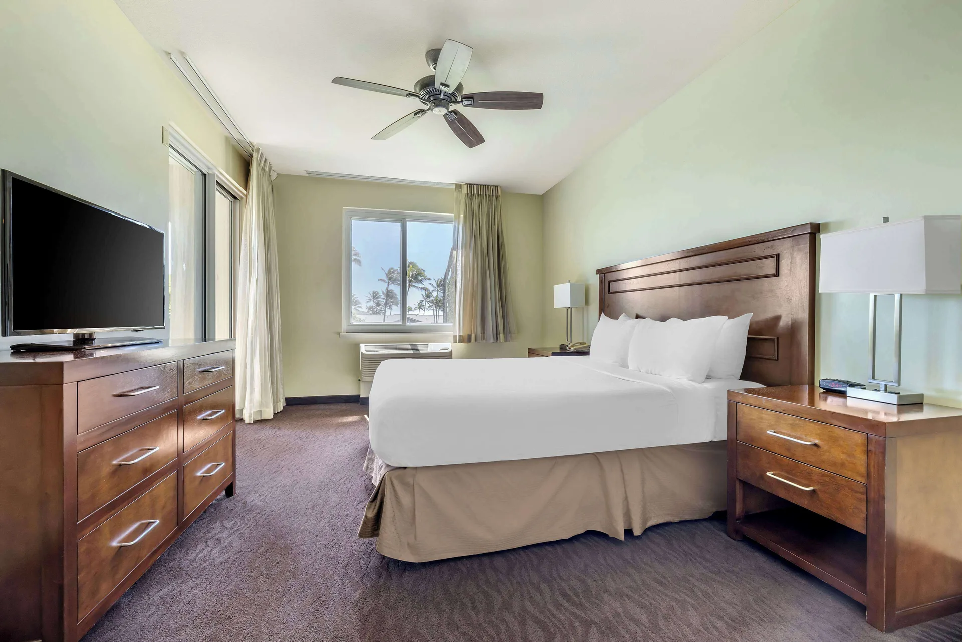 King bedroom in a 2 Bedroom Garden View Suite at Hilton Vacation Club The Point At Poipu Kauai.