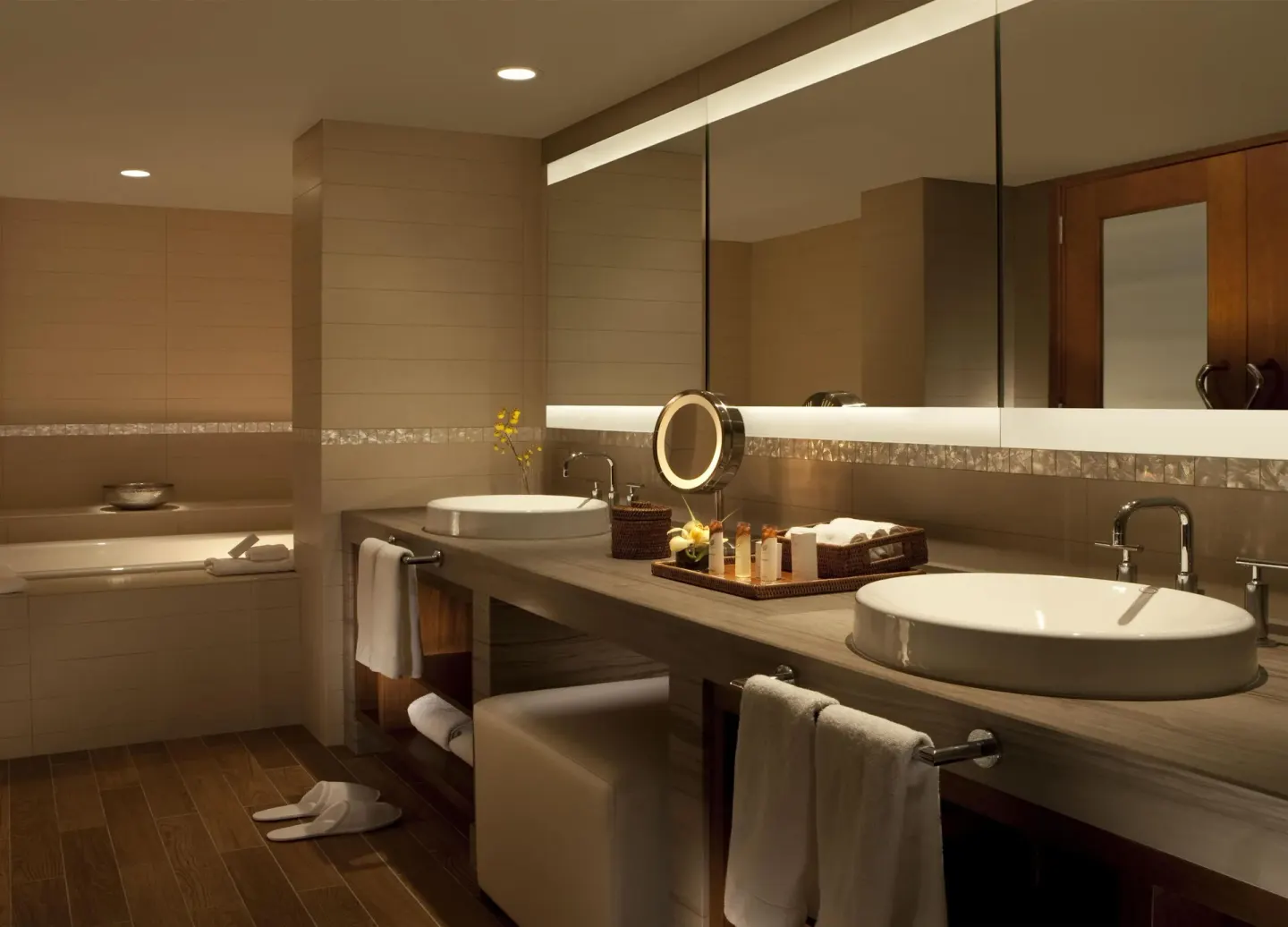 Makai Owner Suite bathroom with double vessel sinks at Hilton Waikoloa Village.